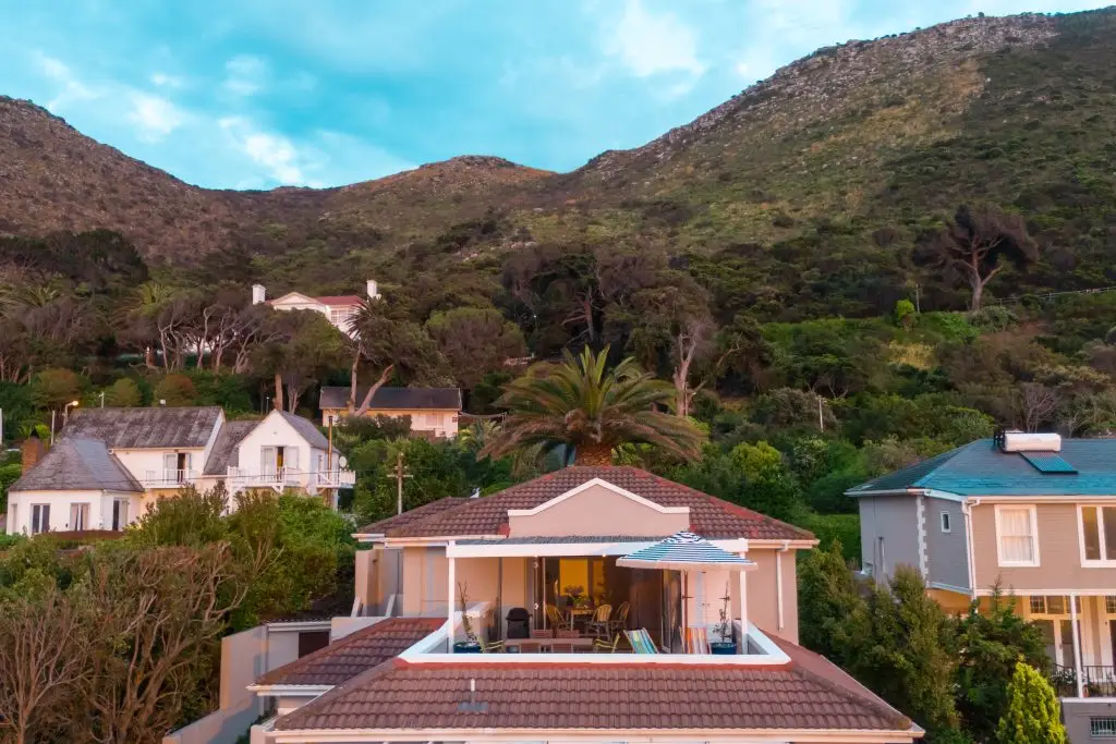 Aerial view of Bliss Seaside Apartment located between the mountains and False Bay in Kalk Bay.